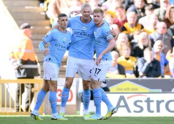 Erling Haaland scores again in a 3-0 win at Molineux Stadium to make Premier League history. 