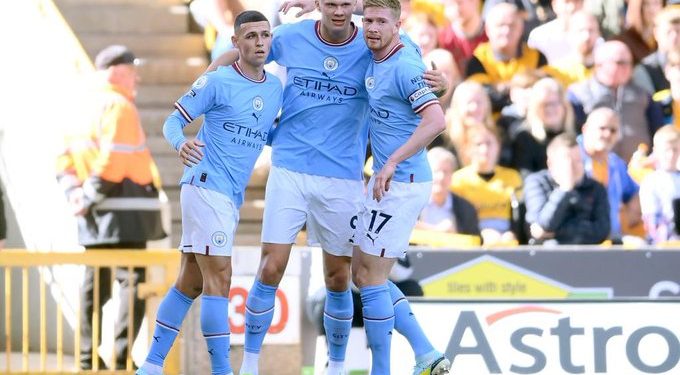 Erling Haaland scores again in a 3-0 win at Molineux Stadium to make Premier League history. 