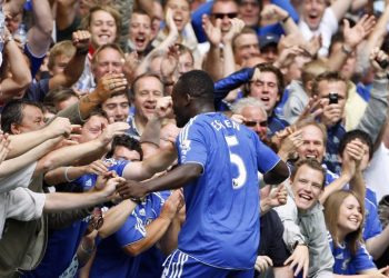 Michael Essien, a former Ghana midfielder, reacts after receiving a UEFA coaching certificate.