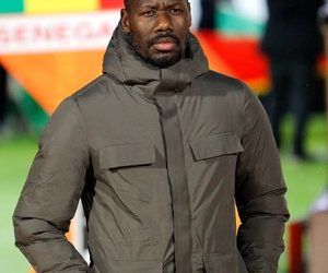 Which of the two coaches wins the 60% increase in prize money from CAF: Madjid Bougherra or Pape Thiaw?