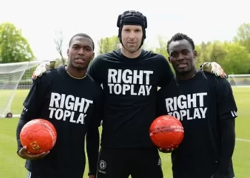 Daniel Sturridge congratulates Michael Essien on obtaining a UEFA A coaching license.